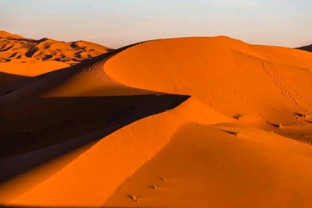 Golden Erg Chebbi dunes in the Merzouga Sahara Desert during a 5 Days Marrakech Desert Tour